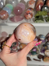 Load image into Gallery viewer, Peachy Banded Carnelian Sphere
