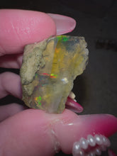 Load and play video in Gallery viewer, Rainbow Waves Ethiopian Water Opal
